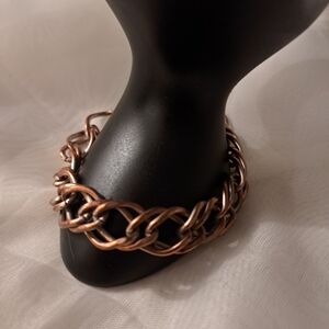 Copper-tone and Slight Tone Silver Bracelet.
